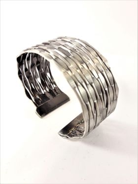 Genombrutet Stelt Armband Silverfärg