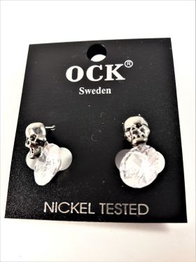 Örhängen med döskallar och gnistrande sten