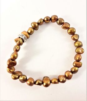 Enkelt Armband med Små Guldfärgade Pärlor och Ring med Strass