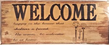 Plåttavla med texten "Welcome".