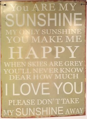 Plåttavla med texten "You are my sunshine...".