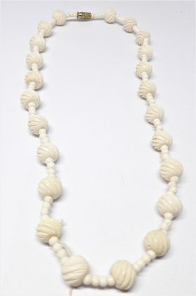 Halsband, ben, räfflade kulor