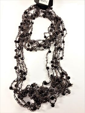 Flerradigt halsband med kulor och pärlor brun