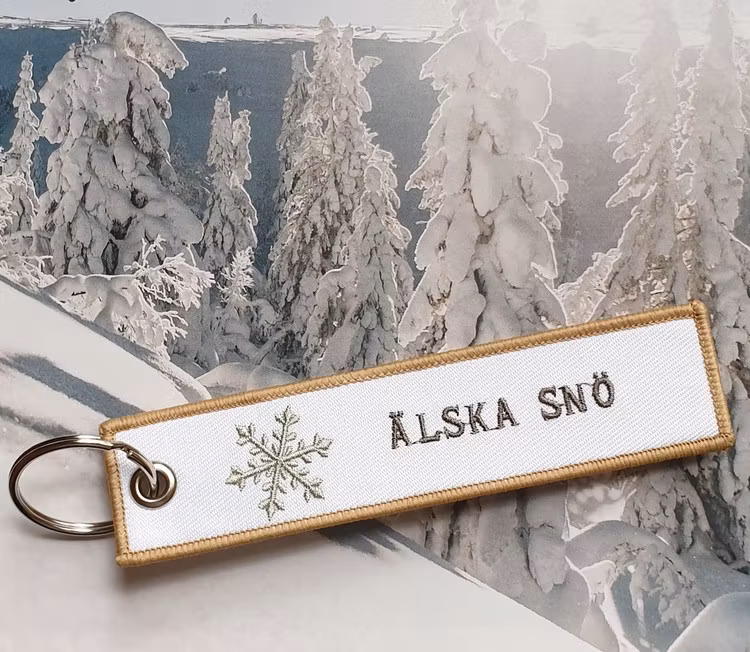 Tag/Nyckelring Älska snö