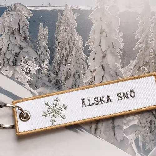 Tag/Nyckelring Älska snö