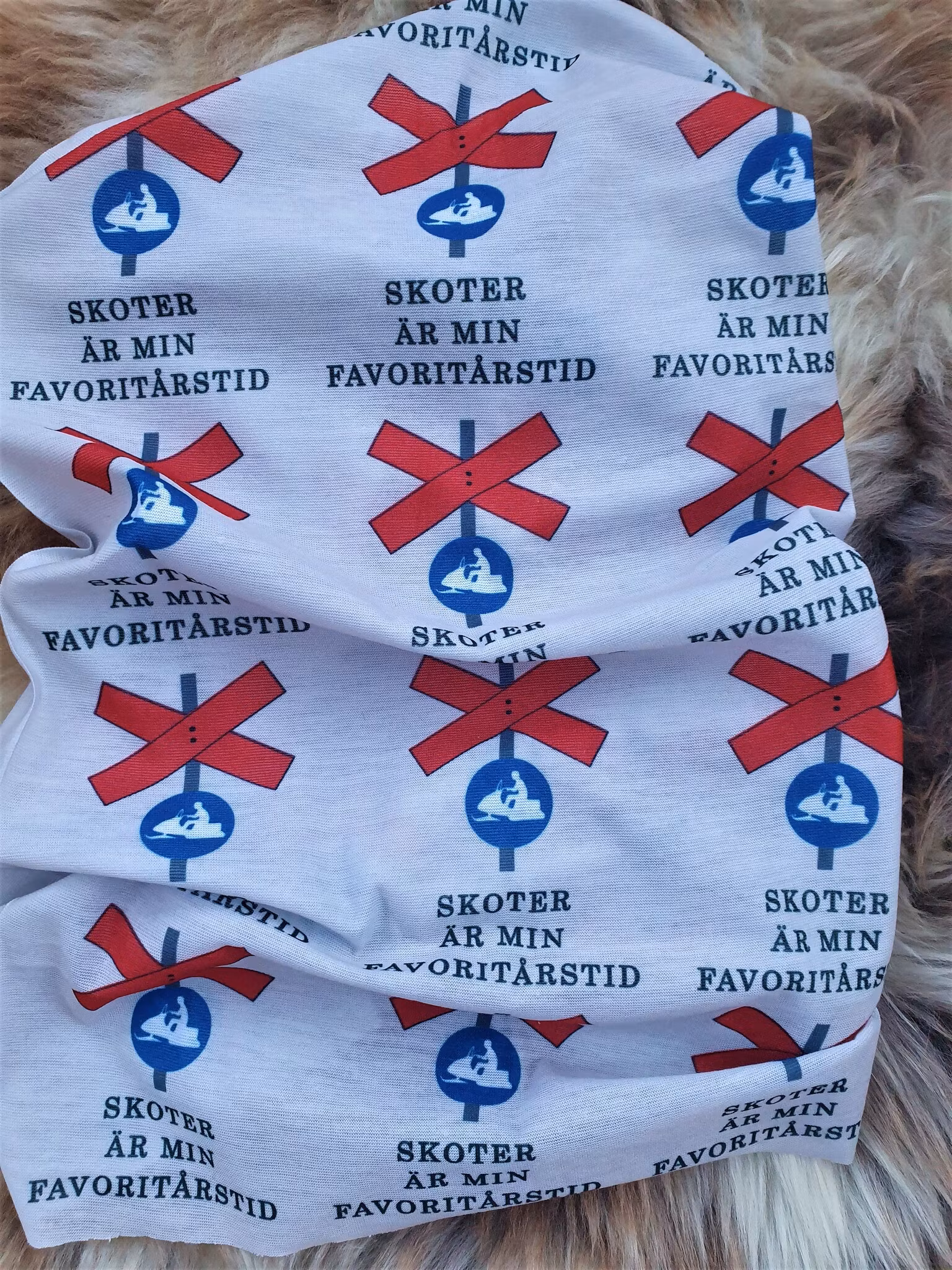Tubhalsduk, buff Skoter