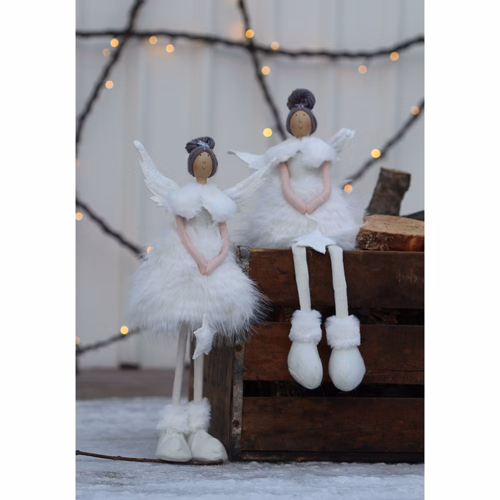 Sittande ängel Clara