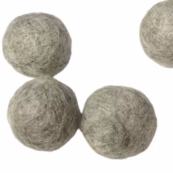 Filtbollar m frigolitkärna ljusgrå