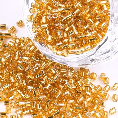 Seedbeads 2mm hexagon guld silverlined