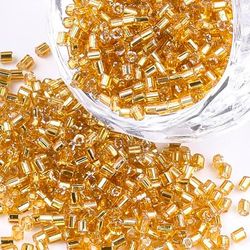 Seedbeads 2mm hexagon gold silverlined