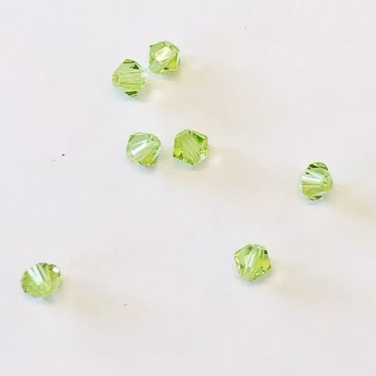 Pärla bicone glas ljusgrön 4mm 10-p