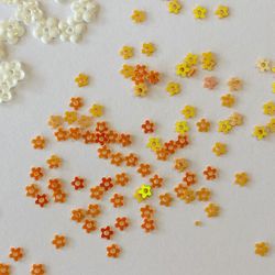 Paljett blomma orange 2,5mm