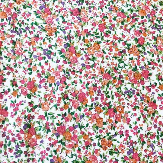 Bomullstyg blommigt rosa orange