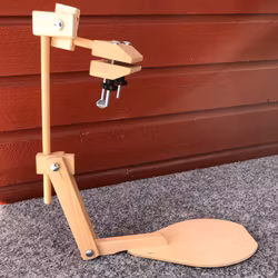 Ställning för sybåge att sitta på