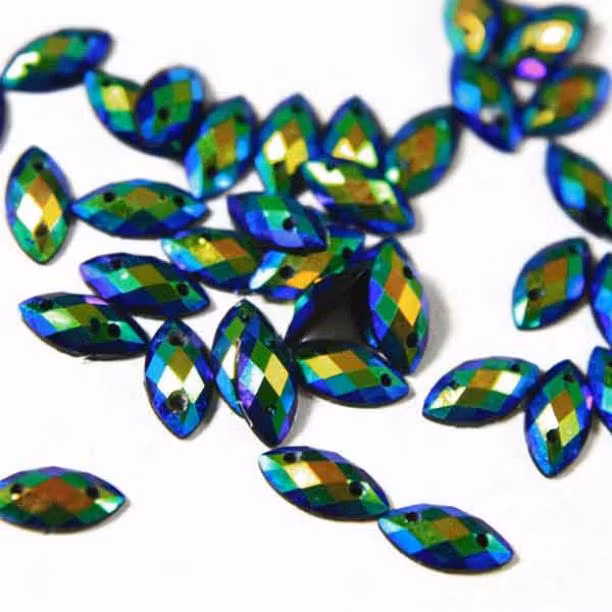 Pärla oval platt 8x4mm blågrön 12-p