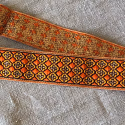 Dekorband orange med guldkors
