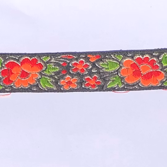 Dekorband svart med blommor i rött, orange & grönt