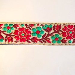 Decorative ribbon flowers red, burgundy & green