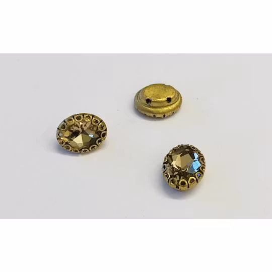 Montee oval 7x9mm ljus topas