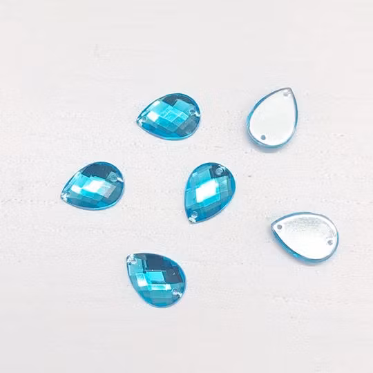 Pärla 10x14mm droppformad turkos