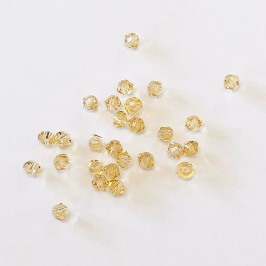 Pärla bicone glas blekguld 3mm