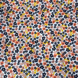 Bomullstyg småblommigt gult svart orange