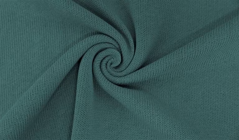 Stickat tyg mörk grågrön