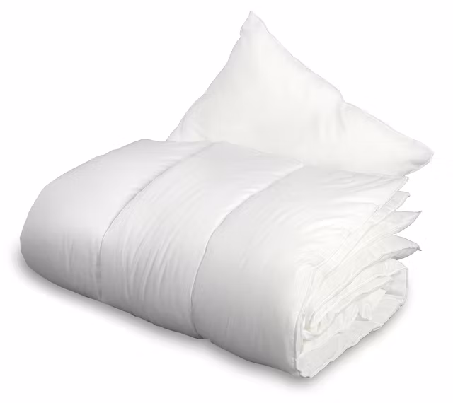 Standard täcke och kudde spjälsäng