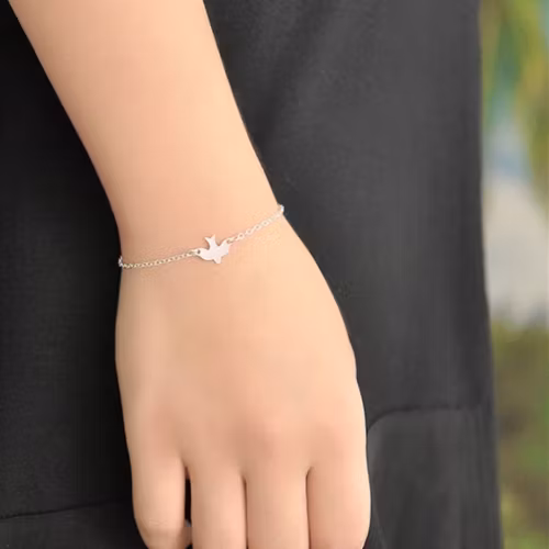 Armband med liten fågel