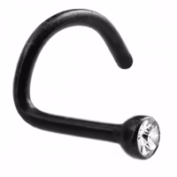 Svart näspiercing med vit ädelsten