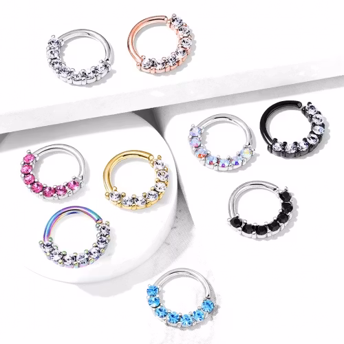 Piercingring med sju stycken ädelstenar