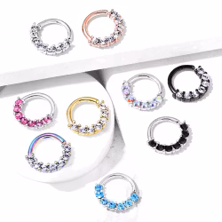 Piercingring med sju stycken ädelstenar