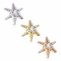 Dermal topp med stjärna