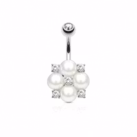 Navelpiercing med pärlor och stenar