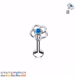 Labret med blomma och sten