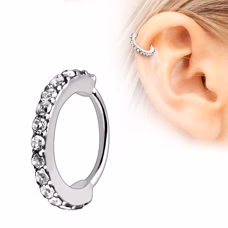 Piercingring med ädelstenar på sidan