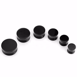 Svart solid akryl plugg