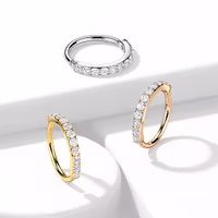 Piercingring med inbäddade ädelstenar