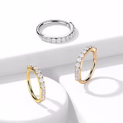 Piercingring med inbäddade ädelstenar