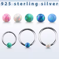 Segmentring i silver med opalsten
