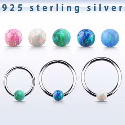 Segmentring i silver med opalsten