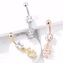 Navelpiercing med ädelstens uggla