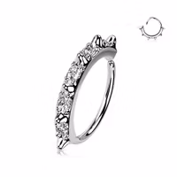 Piercingring med spikes och ädelstenar