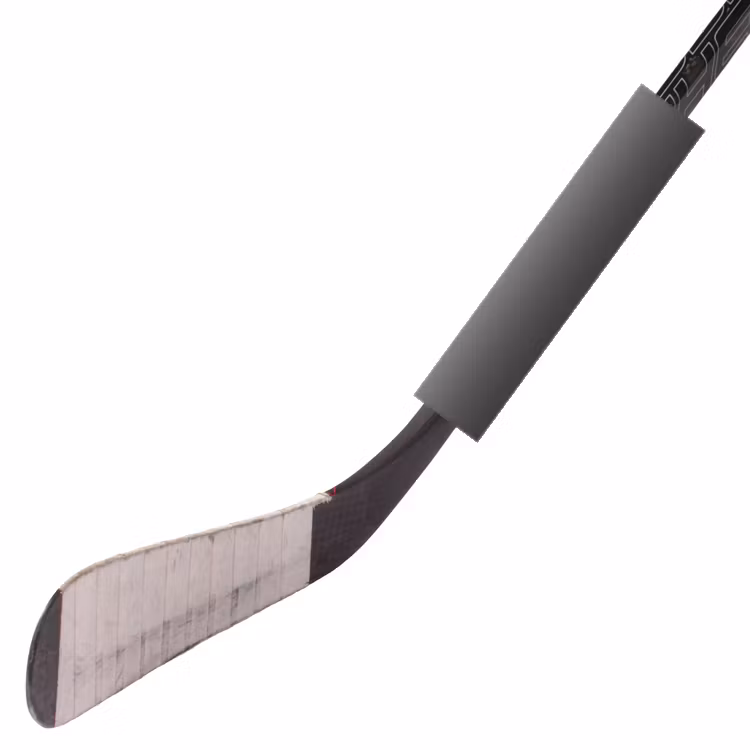 Klubbvikt för hockey monterad på hockeyklubba för träning av handleder och klubbteknik