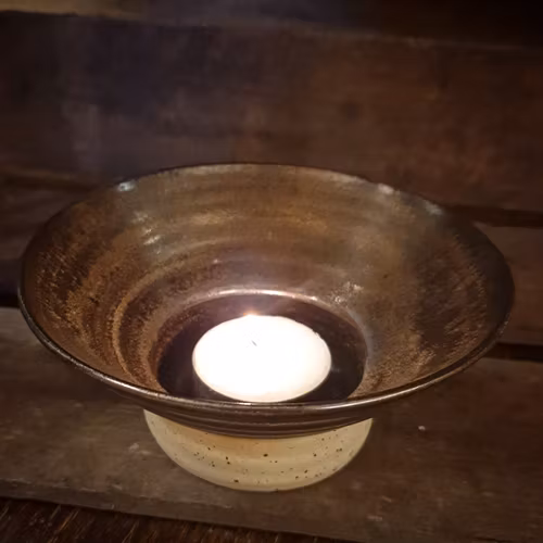 Ljuslykta i bronsnyans