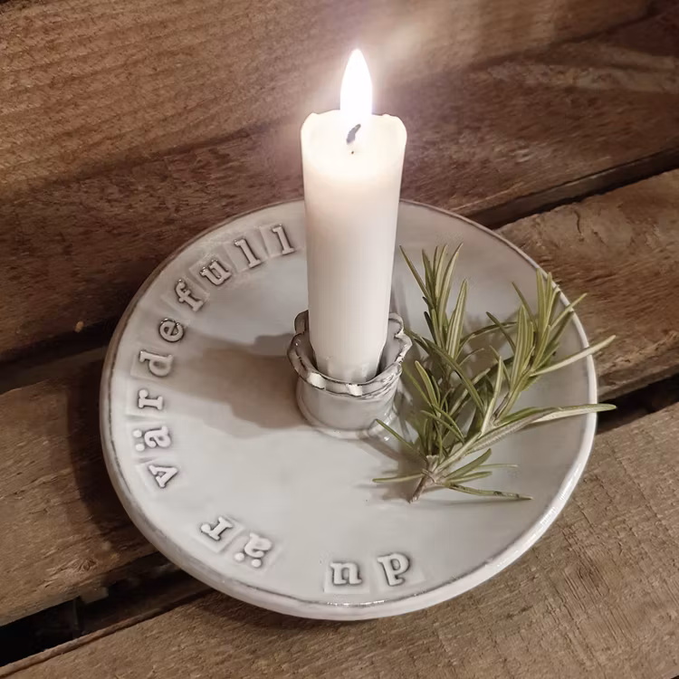 Ljusstake med budskap