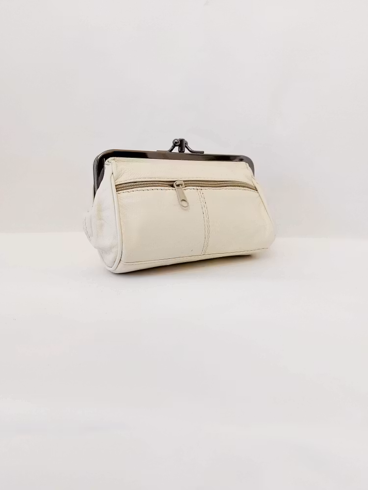 Portmonnä i skinn, rund, bygel 12 cm, flera olika färger