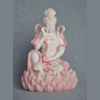 Kuan-Yin sittande på lotus