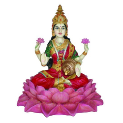 Lakshmi sittande på lotus