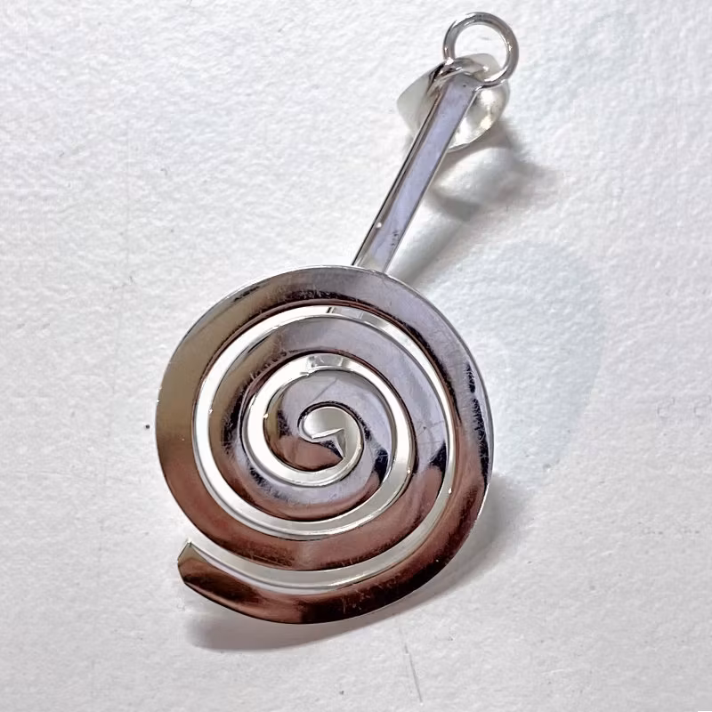 Spiralformad hållare till pi-sten